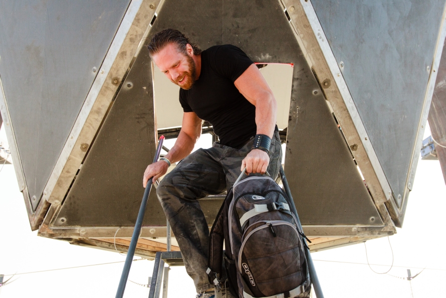 Magnus climbing into the White Ocean stage at Burning Man 2014
