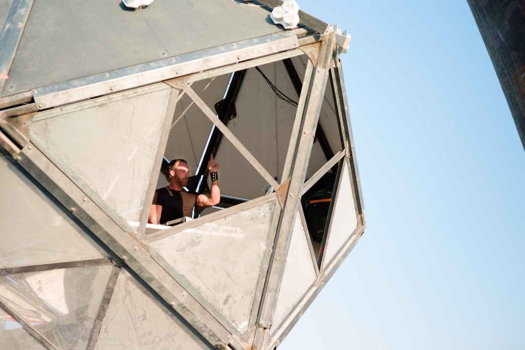 Magnus performing from the White Ocean stage at Burning Man 2014